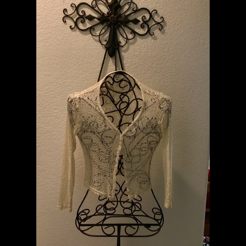 Beautiful delicate button up cardigan.